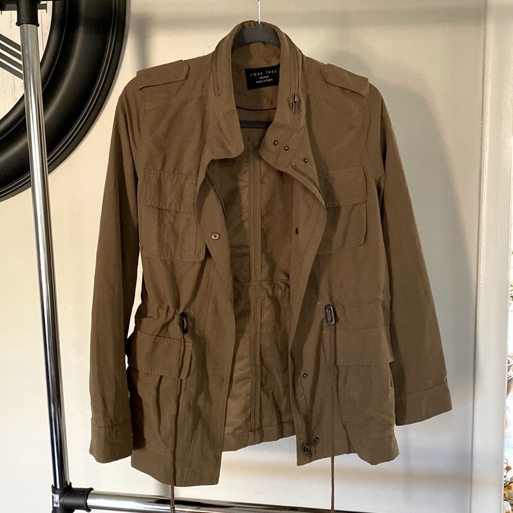 Light weight jacket. Khaki color. Brand new.
